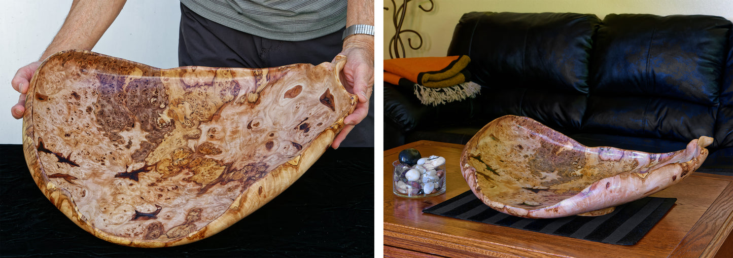 Fancy and irregular 22.5” long maple platter-like bowl sculpted from spalted maple. It has twisted and figured burl patterns, bird's-eye patterns, and rich colors of tan, brown, and gold with a hint of red, 215-A