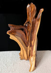 Twisted, free flowing natural wood sculpture, Utah juniper with beautiful grain patterns, one-of-a-kind floor or tabletop.  It measures 27 tall x 13.25 x 12’’, 15 lbs.  With natural patterns on a plain black background