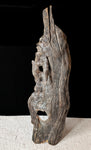 Front view of a 34 x 10 x 5.5 inches natural Ponderosa pine, longtime dead and down weathered wood that has been preserved and is ready to hang as a wall decor or set up as a tabletop sculpture.  It has two natural branch holes and a rough gray color.