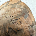 Artist Robert C Paulson Jr's signature and wood species showing on the bottom view of figured maple wooden irregular bowl, smooth and soft with beautiful grain patterns, intriguing clear epoxy-filled fine cracks and rich natural colors (no stains or artificial colors added).  It measures 6 tall x 23 x 16’’, 5.8 lbs. 