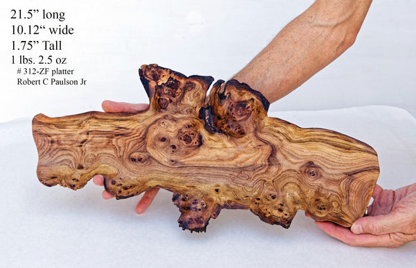21 inch wooden platter serving tray sculpture held by a person, with dimensions and weight details on a white background